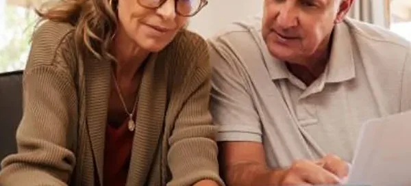 Older-couple-looking-at-electrical-bill